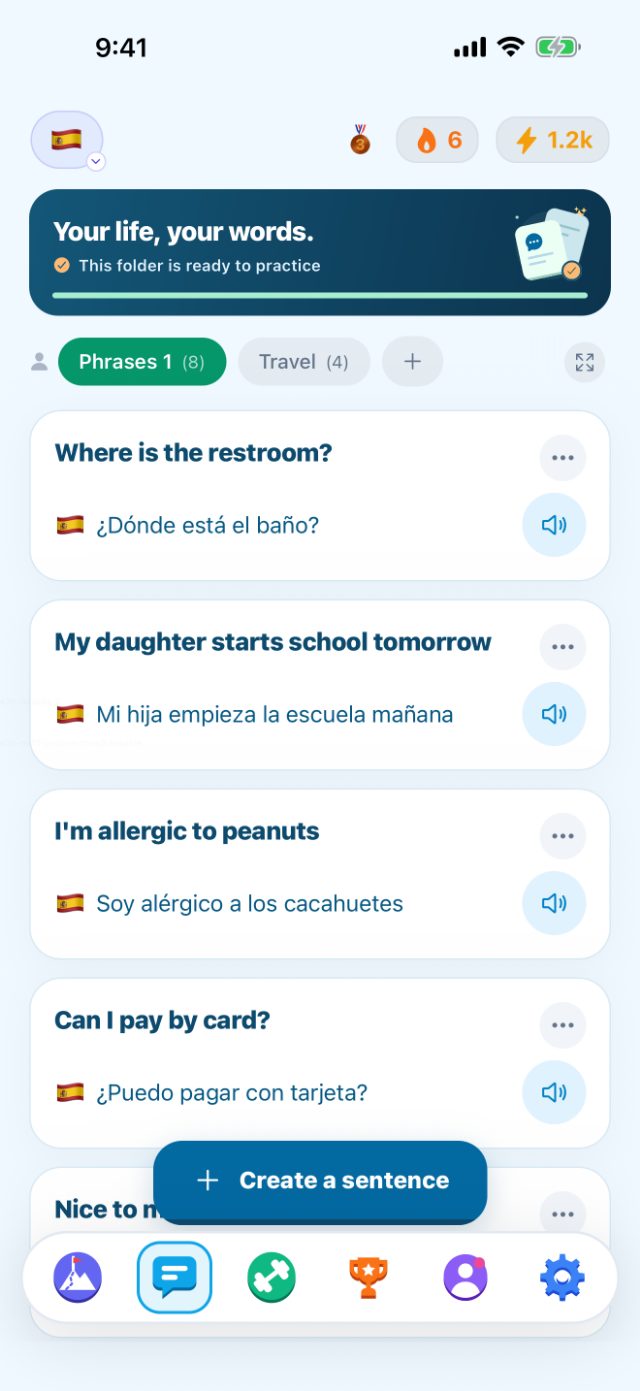 The PhrasiGo phrasebook, showing saved Spanish phrases with audio buttons